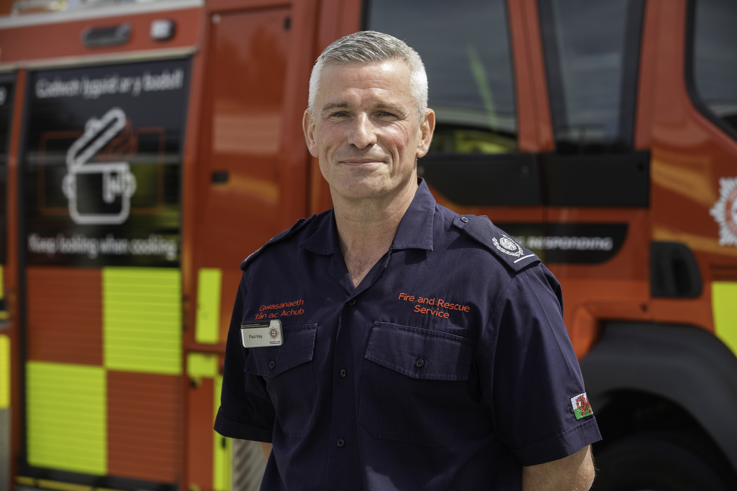 Head of Fire Safety Paul Kay in front of a fire engine